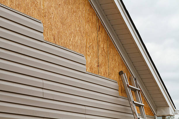 Professional Emergency Siding Repair technician working in Beaver, WV